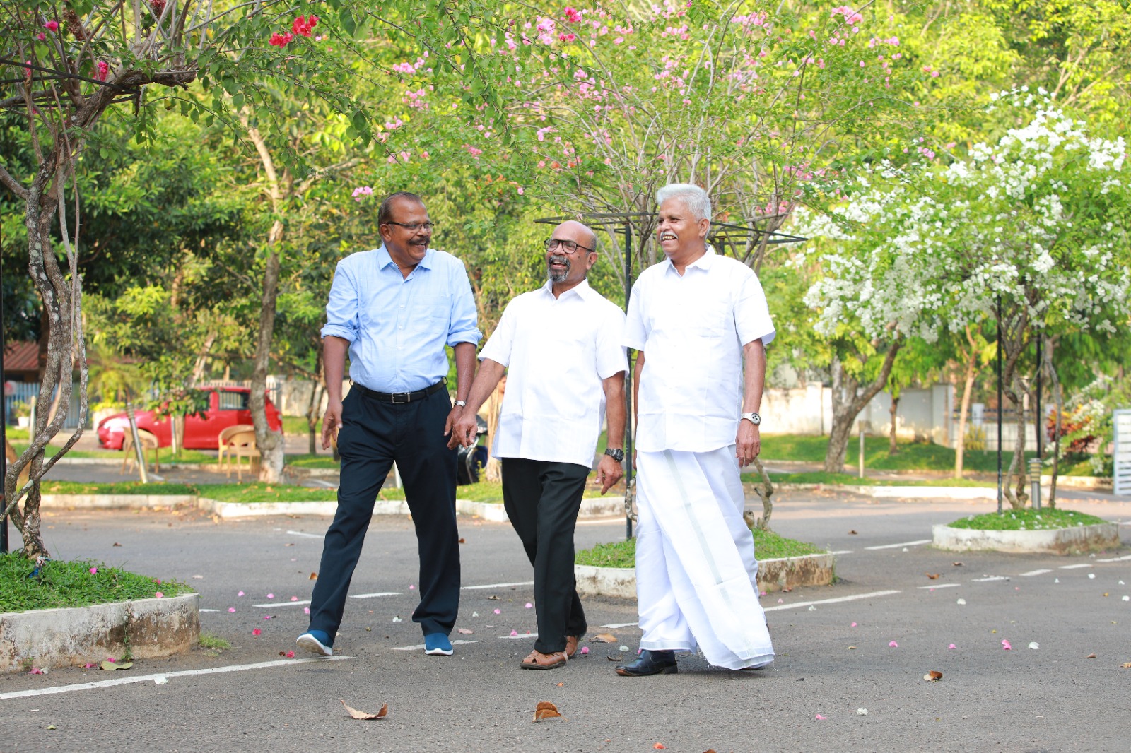 Residents walking together under trees